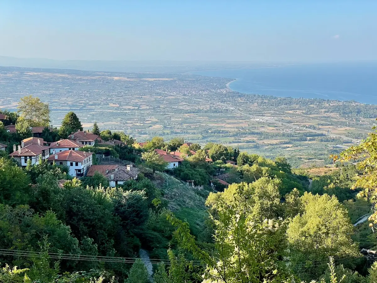 View from Palaios Panteleimonas over the stone houses down to the coast of Pieria
                and the Thermaic Gulf